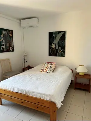 Un ou plusieurs lits dans un hébergement de l'établissement Appartement Hauts de Vaugrenier