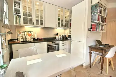 Cuisine ou kitchenette dans l'établissement magnifique 2 pièces parc de la croisette