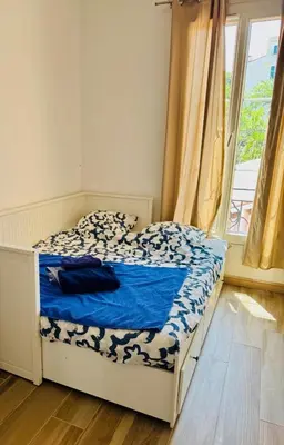 Un ou plusieurs lits dans un hébergement de l'établissement Casa Blue Azur - Juan Les Pins