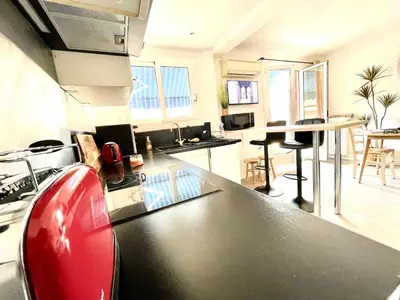 Coin salon dans l'établissement Le Coeur de Golfe Juan - aircon - 9 min to sea