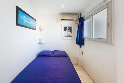 Un ou plusieurs lits dans un hébergement de l'établissement AHC - Versailles- 2 pièces centre ville