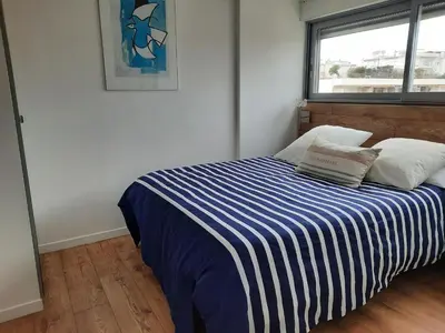 Un ou plusieurs lits dans un hébergement de l'établissement One bedroom apartment Palm Beach