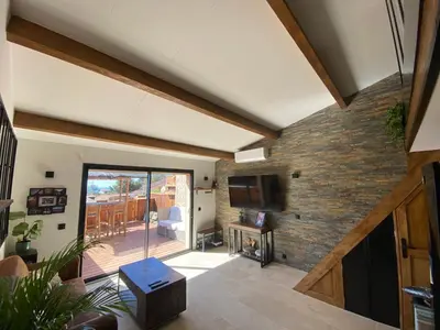 Télévision ou salle de divertissement dans l'établissement Maison de la quieta