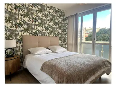 Un ou plusieurs lits dans un hébergement de l'établissement Appartement rénové à Juan les Pins avec parking - FR-1-252-198