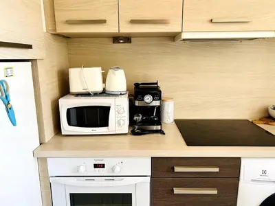 Cuisine ou kitchenette dans l'établissement Le barquier