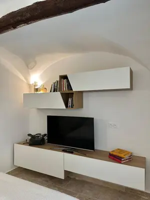 Télévision ou salle de divertissement dans l'établissement Riviera Cottage