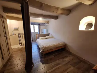 Un ou plusieurs lits dans un hébergement de l'établissement Vue et charme provençal à Biot - La Maison du Mitan