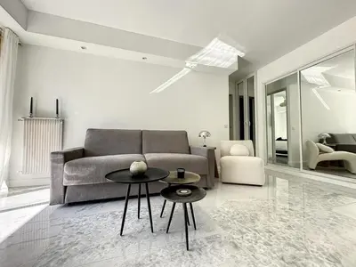 Coin salon dans l'établissement Cannes Centre Mimosas 1 chambre Salon