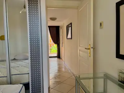 Un ou plusieurs lits dans un hébergement de l'établissement Appartement Villeneuve Loubet