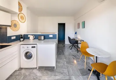 Cuisine ou kitchenette dans l'établissement L'Astrolabe - Studio - refurbished - seaside