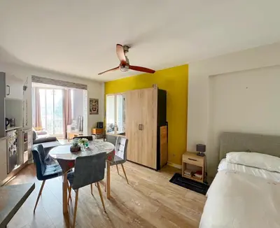 Un ou plusieurs lits dans un hébergement de l'établissement Charmant Studio - Centre Cannes