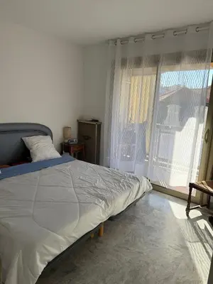 Un ou plusieurs lits dans un hébergement de l'établissement Central location, terrace, 2 bedrooms