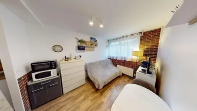 Cuisine ou kitchenette dans l'établissement Appartement cosy bord de mer