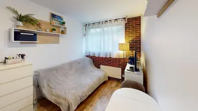 Coin salon dans l'établissement Appartement cosy bord de mer