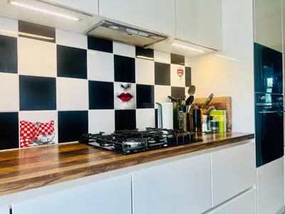 Cuisine ou kitchenette dans l'établissement Le Palais Antibois