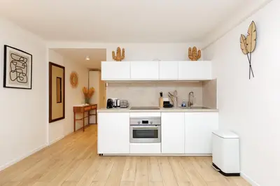 Cuisine ou kitchenette dans l'établissement El Sole - Plage - Wifi - Croisette