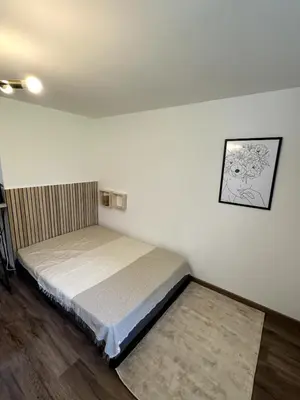 Un ou plusieurs lits dans un hébergement de l'établissement Studio with swimming pool