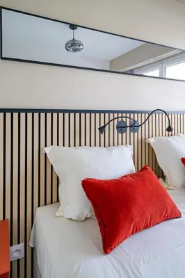 Un ou plusieurs lits dans un hébergement de l'établissement Rooftop 3 pièces avec Piscine face mer