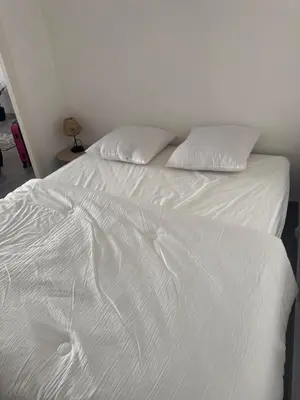 Un ou plusieurs lits dans un hébergement de l'établissement Appartement cosy