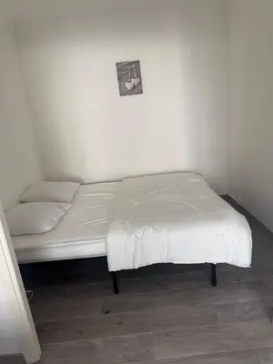 Un ou plusieurs lits dans un hébergement de l'établissement Appartement cosy