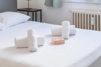 Un ou plusieurs lits dans un hébergement de l'établissement Appartement Rochat - Welkeys