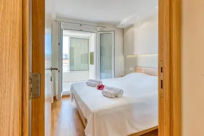 Un ou plusieurs lits dans un hébergement de l'établissement Port Azur Sea View - Happy Rentals