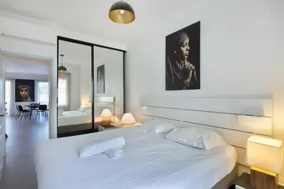 Un ou plusieurs lits dans un hébergement de l'établissement YELLOW DUBOY D'ANGERS 2 Bedrooms