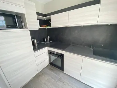 Cuisine ou kitchenette dans l'établissement Cannes proche Croisette - Studio moderne balcon