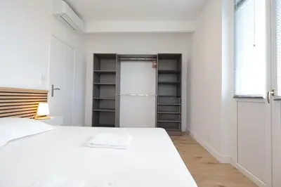 Un ou plusieurs lits dans un hébergement de l'établissement Cosy Muguets - Luxury Apartment for 6 People with Sea View