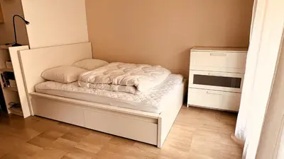 Un ou plusieurs lits dans un hébergement de l'établissement Studio spacieux avec terrasse, à 150m de la plage