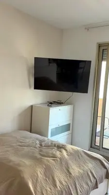 Un ou plusieurs lits dans un hébergement de l'établissement Studio spacieux avec terrasse, à 150m de la plage
