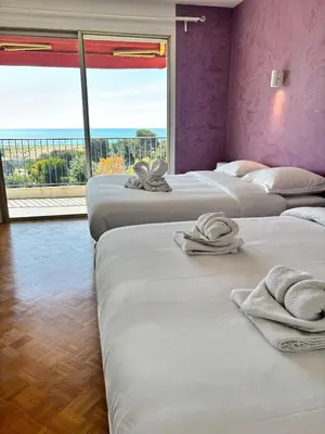 Un ou plusieurs lits dans un hébergement de l'établissement Splendid T6 Panoramic sea view Free Parking