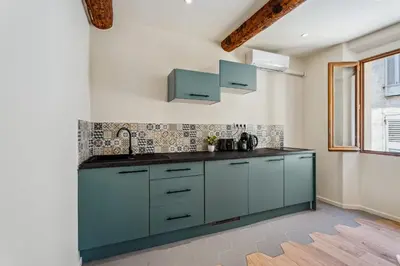Cuisine ou kitchenette dans l'établissement Appartement T1bis Diane - Welkeys