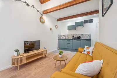 Télévision ou salle de divertissement dans l'établissement Appartement Castelet - Welkeys