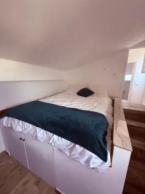 Un ou plusieurs lits dans un hébergement de l'établissement Charme, Pierres, Appartement Vieil Antibes