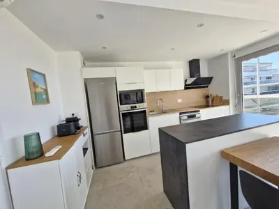 Cuisine ou kitchenette dans l'établissement TANIT Incroyable vue sur des Îles