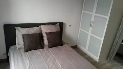 Un ou plusieurs lits dans un hébergement de l'établissement Safranier Townhouse