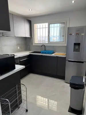 Cuisine ou kitchenette dans l'établissement Le Prestigieux - plage