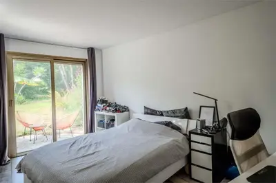 Un ou plusieurs lits dans un hébergement de l'établissement Magnifique villa avec piscine