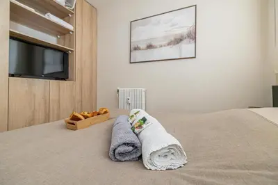 Un ou plusieurs lits dans un hébergement de l'établissement Super appartement centre Juan les Pins proche mer