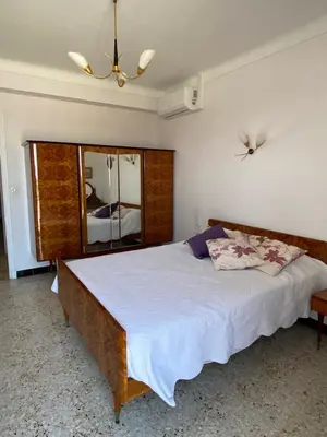 Un ou plusieurs lits dans un hébergement de l'établissement Appartement dans Villa à Antibes avec Vue Mer
