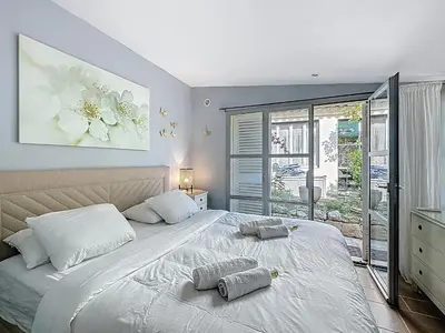 Un ou plusieurs lits dans un hébergement de l'établissement 126m2 - maison plage, 3 chambres, 3 salles de bain