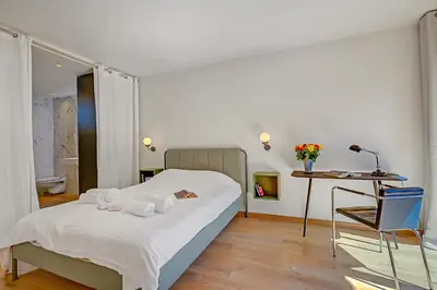 Un ou plusieurs lits dans un hébergement de l'établissement Antibes Loft Retreat - Happy Rentals
