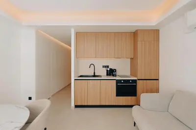 Cuisine ou kitchenette dans l'établissement T2 Neuf et chic à deux pas de la Croisette