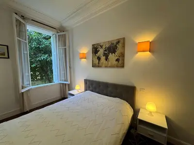 Un ou plusieurs lits dans un hébergement de l'établissement Beau 2 pièces, art déco, plein centre
