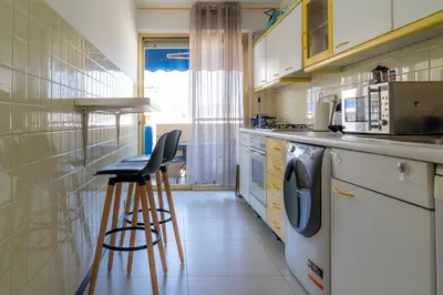 Cuisine ou kitchenette dans l'établissement Proche plages Parking Etage élevé Terrasse