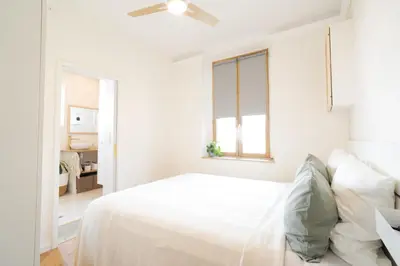 Un ou plusieurs lits dans un hébergement de l'établissement Appartement Villa Toki-Ona