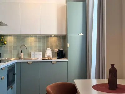 Cuisine ou kitchenette dans l'établissement Suite Chic Carré d'Or - 3min Palais & plages Croisette