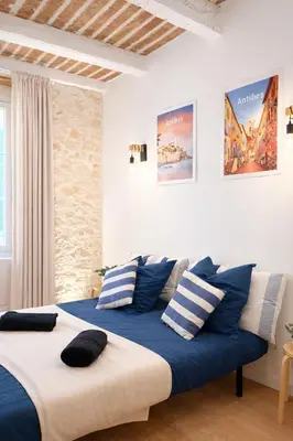 Un ou plusieurs lits dans un hébergement de l'établissement Provençal Studio - Vieil Antibes