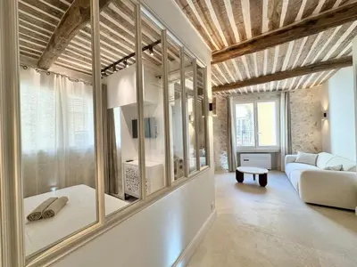 Un ou plusieurs lits dans un hébergement de l'établissement Luxe et Charme sur les Remparts du Vieil Antibes